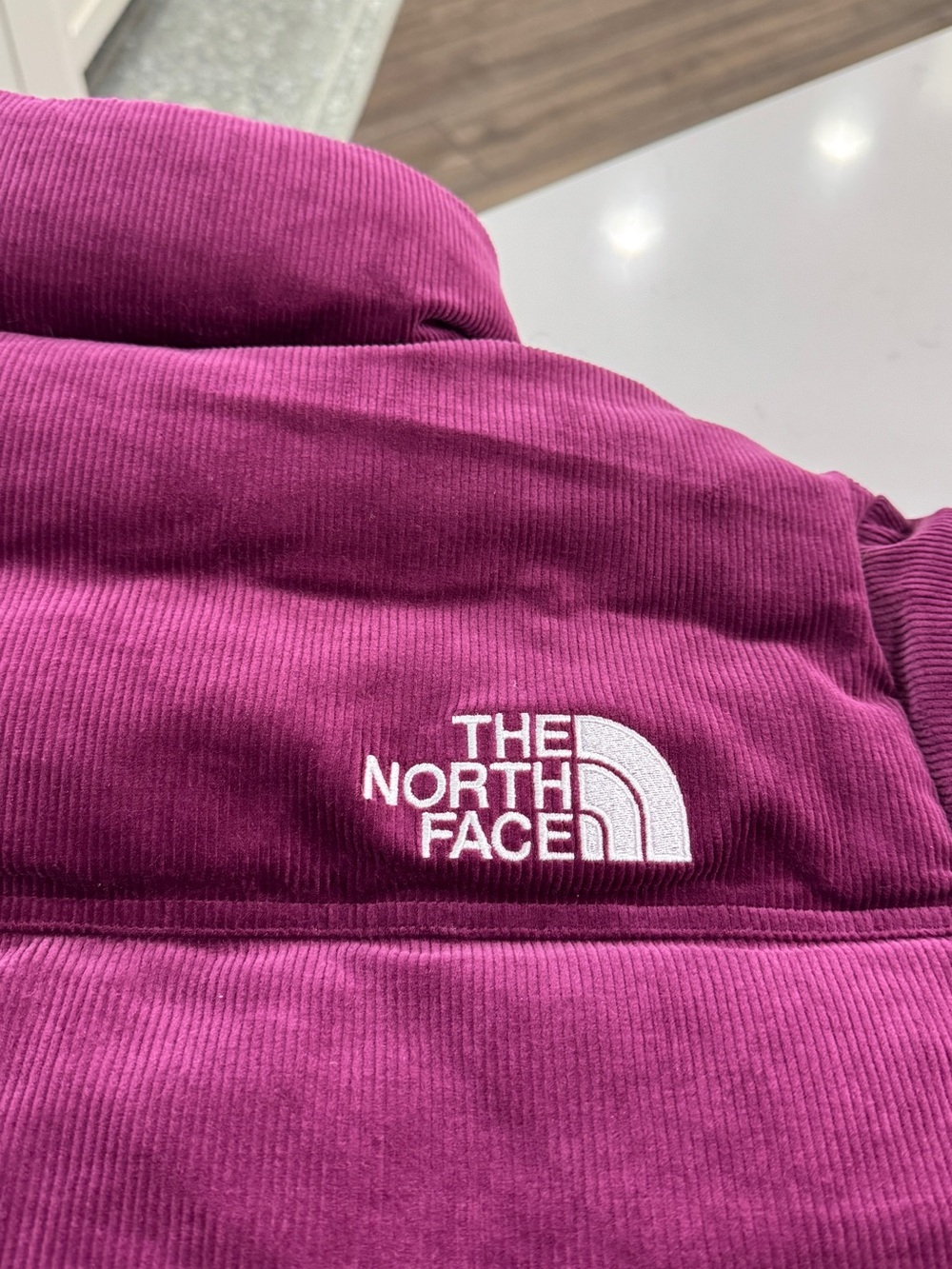The North Face Women's 92 Reversible Corduroy Nuptse Jacket in Boysenberry - Picture 5 of 6
